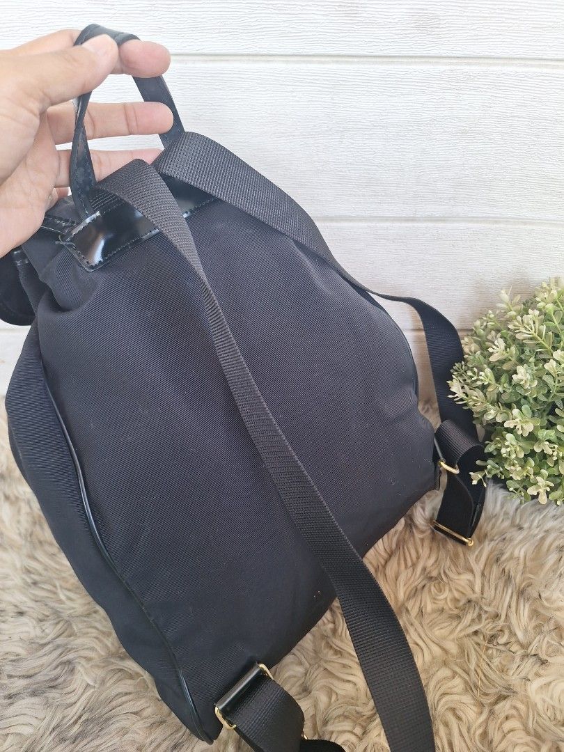 MOSHINO backpack (Category: Luxury Bags & Wallets) located in Tagum. Submitted by ynez.luxurypicksph (Listing ID 1350024754, Image 2). Description: preloved Japan medium please check photos closely for the signs of usage.
