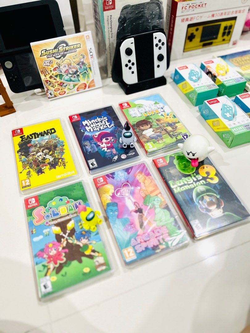 Nintendo Accessories, Games and Controllers (Category: Nintendo) located in Taguig. Submitted by crelscozynook (Listing ID 1350018585, Image 2). Description: Brand New Items * Controller Racing Wheel - P200 * Mini Gamepad (Yellow & Blue) - P595 each * Mini Gamepad Zero 2 (Pink) - P830 * Switch Pro Joy-Con Charging Grip with Dock - P1,100 * Switch Game: Soldam Drop - P700 * Switch Game: Arcade Spirits - P1,495 * 3DS Game: Sushi Striker The Way of 