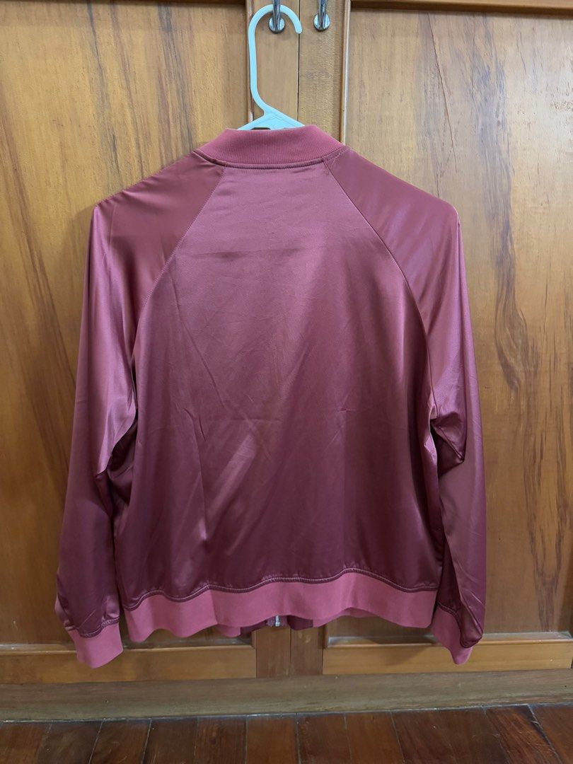 Uniqlo Satin Bomber Jacket (Category: Coats, Jackets and Outerwear) located in Quezon City. Submitted by monsdeclutter (Listing ID 1349976431, Image 3). Description: Authentic, bought in store No when worn Actual color may vary (due to lighting and camera settings) Price negotiable but no to lowballing MOP: Gcash MOD: SDD (grab/lalamove) or GGX Note: Strictly payment first before shipping SDD booked by buyer SF shouldered by buyer.