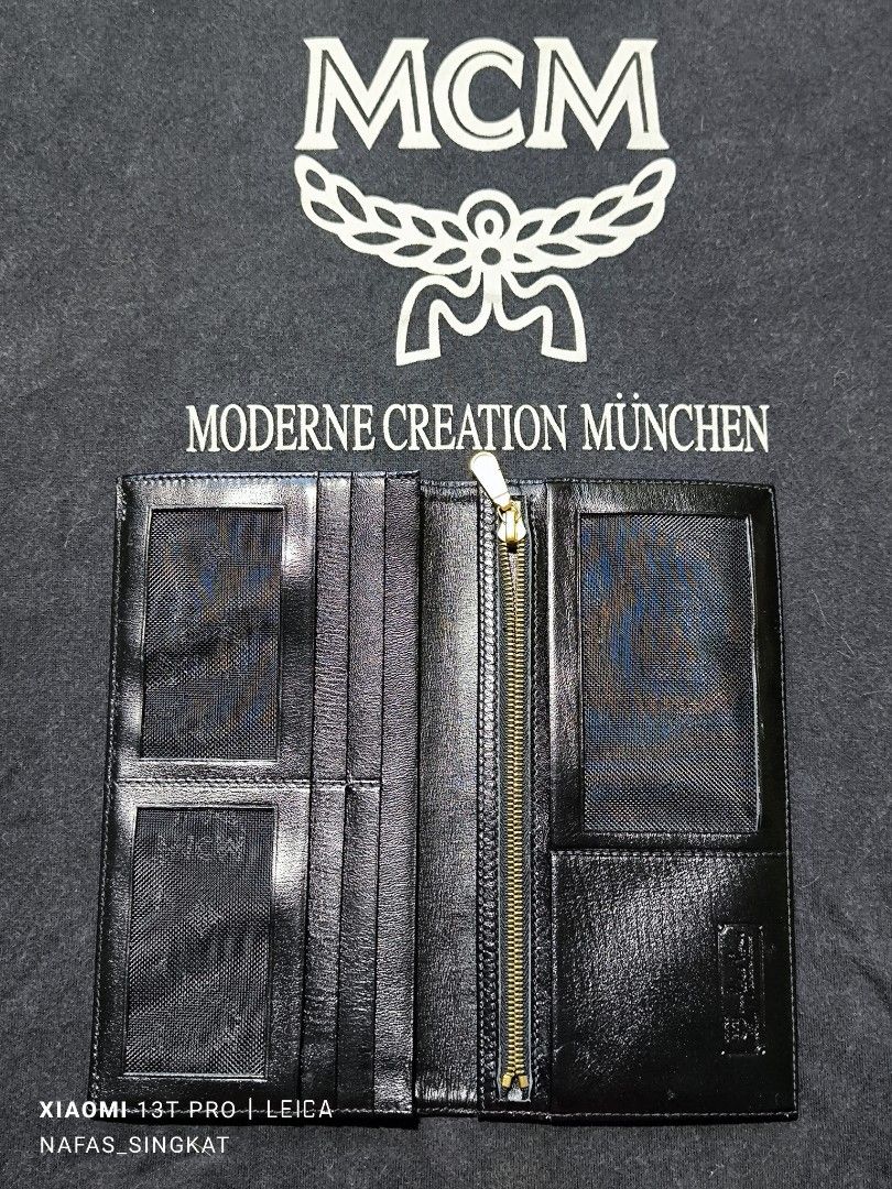 Vtg MCM visetos nylon (Category: Bags & Wallets) located in Singapore. Submitted by rajaaizat9794 (Listing ID 1349931315, Image 1). Description: long wallet nylon mix leather item in good condition rate 9.8/10 price can nego.
