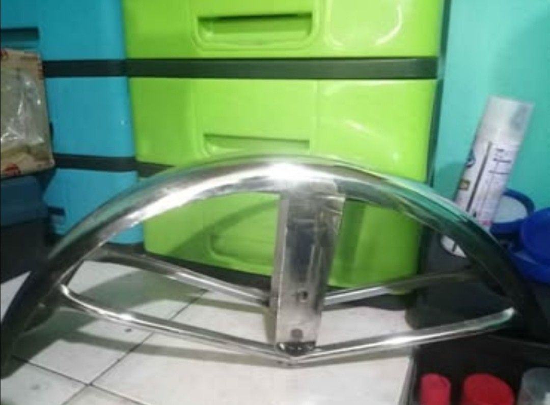 Yamaha rs100 front fender (Category: Body Parts and Accessories) located in Pateros City. Submitted by romferarc333 (Listing ID 1349919241, Image 2). Description: Yamaha RS100 Stainless front fender. Nagamit na pero maayos pa. No brand. Sakto lang ang kapal. Location:Pateros.