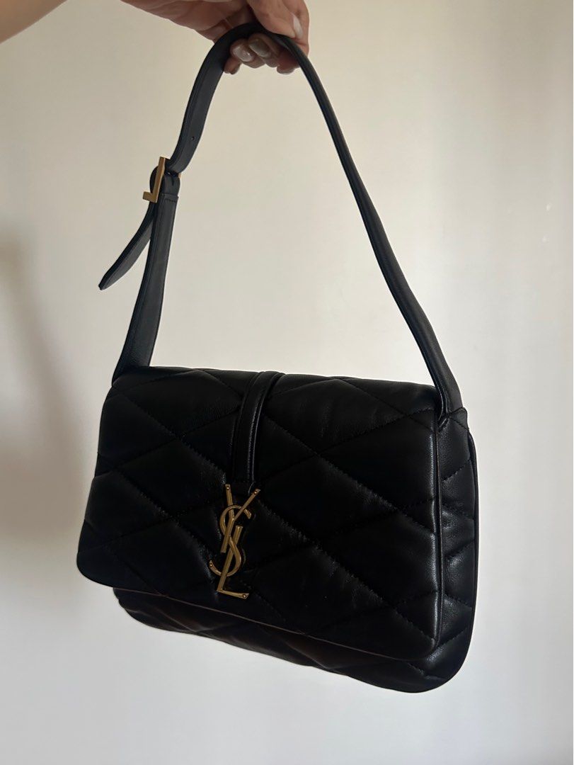 YSL Black Quilted Hobo (Category: Luxury Bags & Wallets) located in Antipolo. Submitted by ivychillz (Listing ID 1349974788, Image 2). Description: >Authentic YSL Black Quilted Lambskin Le 57 Hobo >Selling low bc of signs of use: Hardware, Concealer Stain inside bag seen in photos (last slide) >Dimensions: 10.5 X 2.2 X 3 >Handle Drop: 8.00 In >Includes Bag & Dustbag .