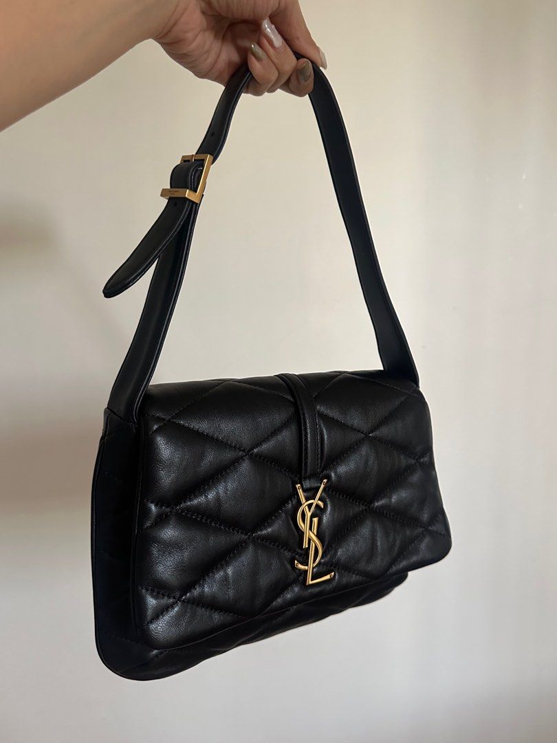 YSL Black Quilted Hobo (Category: Luxury Bags & Wallets) located in Antipolo. Submitted by ivychillz (Listing ID 1349974788, Image 3). Description: >Authentic YSL Black Quilted Lambskin Le 57 Hobo >Selling low bc of signs of use: Hardware, Concealer Stain inside bag seen in photos (last slide) >Dimensions: 10.5 X 2.2 X 3 >Handle Drop: 8.00 In >Includes Bag & Dustbag .