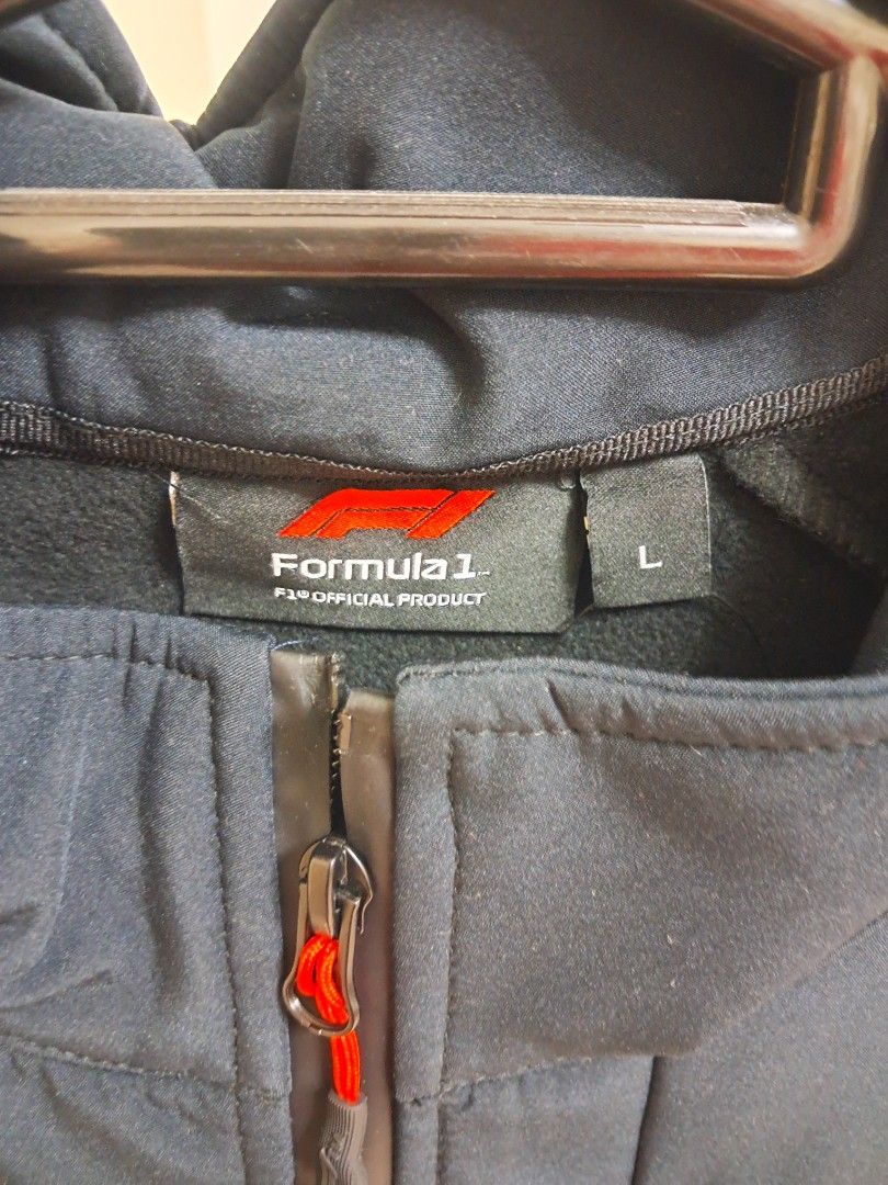 Formula 1 Softshell Jacket (Category: Coats, Jackets and Outerwear) located in Kuala Lumpur. Submitted by mama7781 (Listing ID 1350163167, Image 3). Description: Genuine F1 official merchandise with tags and plastic packaging. Colour black. Size UK L. Bought directly from Germany..