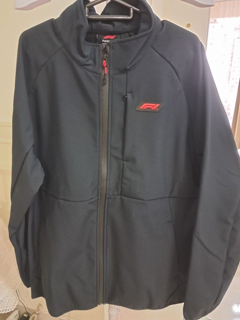 Formula 1 Softshell Jacket (Category: Coats, Jackets and Outerwear) located in Kuala Lumpur. Submitted by mama7781 (Listing ID 1350163167, Image 1). Description: Genuine F1 official merchandise with tags and plastic packaging. Colour black. Size UK L. Bought directly from Germany..