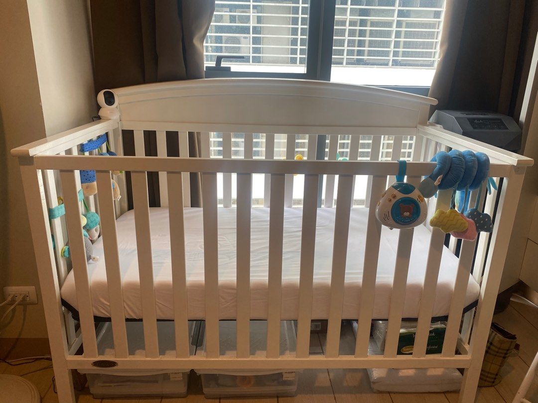 Graco Benton Crib (Category: Cots & Cribs) located in Quezon City. Submitted by stoneyice (Listing ID 1350105152, Image 3). Description: Graco Benton Crib for Sale! This was painted over so it can’t be detached anymore. Size: Length (56.7 inches); Width (29.8 inches); Height (42 inches); Weight (41 pounds) Comes with the following: - Mattress - Bumper Guard Note: The logo was screwed in because the glue came off. See last photo. Other than that, 