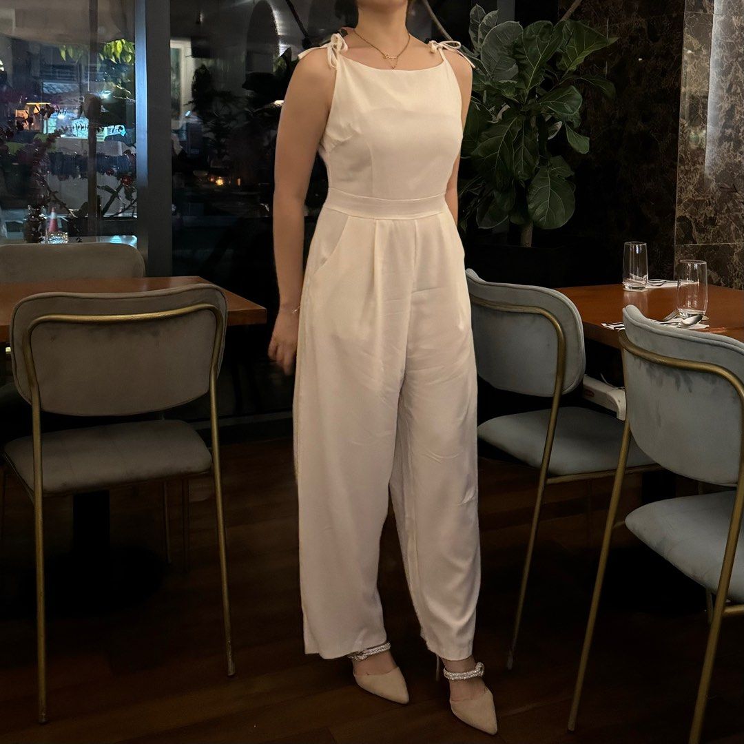 LOVITO Cream Beige White Jumpsuit (Category: Jumpsuits) located in Manila. Submitted by adasclothes (Listing ID 1350167766, Image 1). Description: Used only once. Super in good condition. Fits Small to Medium RFS: declutter 🚚 Same day delivery available via lalamove, angkas, move it 📍 Location: Sampaloc, Manila / UST area / E. Rod, QC.