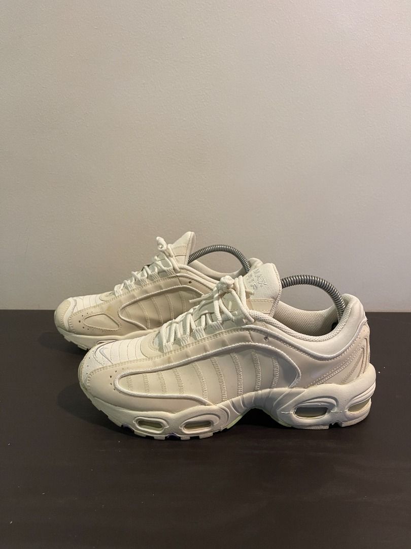 Nike Air Max Tailwind IV (Category: Sneakers) located in Manila. Submitted by notvinch (Listing ID 1350151585, Image 1). Description: Nike Air Max Tailwind IV (SPECIAL EDITION) YOU WILL NOT FIND A BETTER DEAL ANYWHERE ELSE. Color: Beige & White Material: Reflective upper Brand: Nike Condition: Beige Issues: None. Minor stain on the left shoe. Can easily be cleaned with stain remover or detergent. Other details: Used only a few times. Now in stora