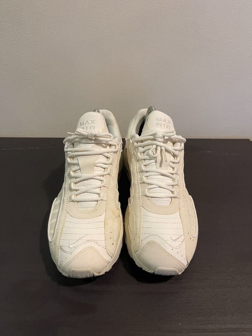 Nike Air Max Tailwind IV (Category: Sneakers) located in Manila. Submitted by notvinch (Listing ID 1350151585, Image 2). Description: Nike Air Max Tailwind IV (SPECIAL EDITION) YOU WILL NOT FIND A BETTER DEAL ANYWHERE ELSE. Color: Beige & White Material: Reflective upper Brand: Nike Condition: Beige Issues: None. Minor stain on the left shoe. Can easily be cleaned with stain remover or detergent. Other details: Used only a few times. Now in stora