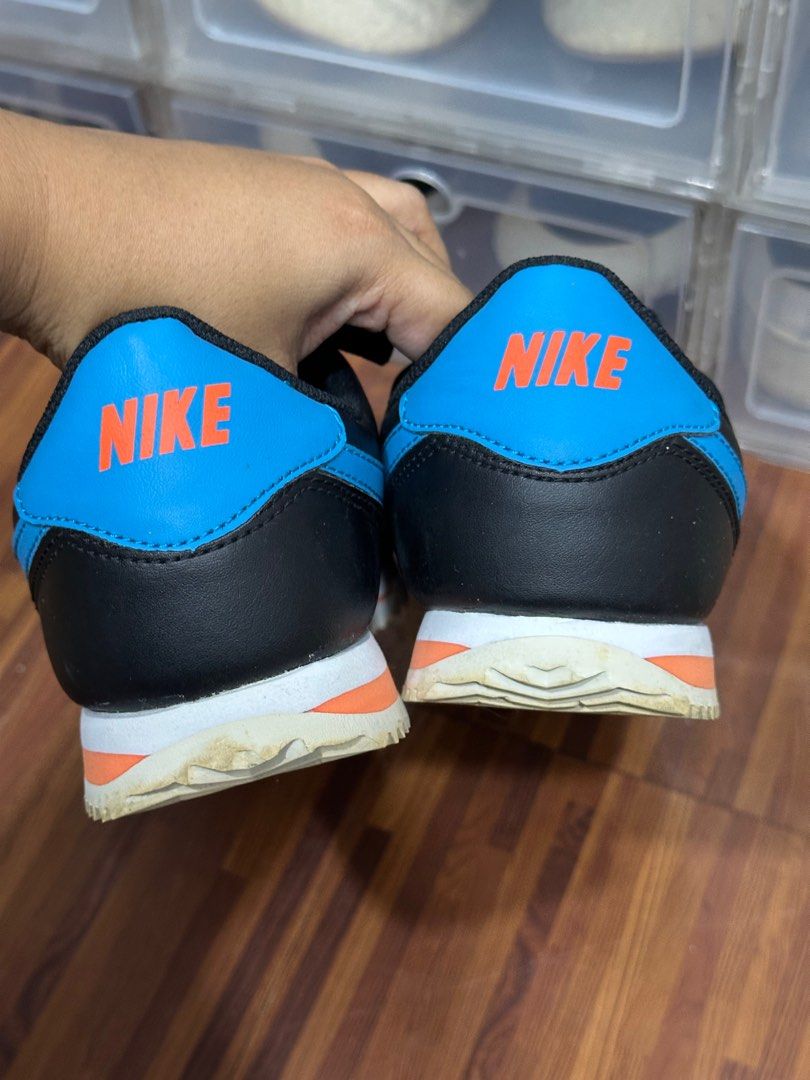 NIKE CORTEZ BLACK/BLUE/ORANGE (Category: Sneakers) located in Quezon City. Submitted by hellosydney78 (Listing ID 1350186517, Image 3). Description: Like new hence selling low See photos for condition (photos are updated) Bought in NIKE APP US 6Y KIDS / 24CM / UK 5.5 / EUR 38.5 / JP240mm Item location: Commonwealth, Quezon City.