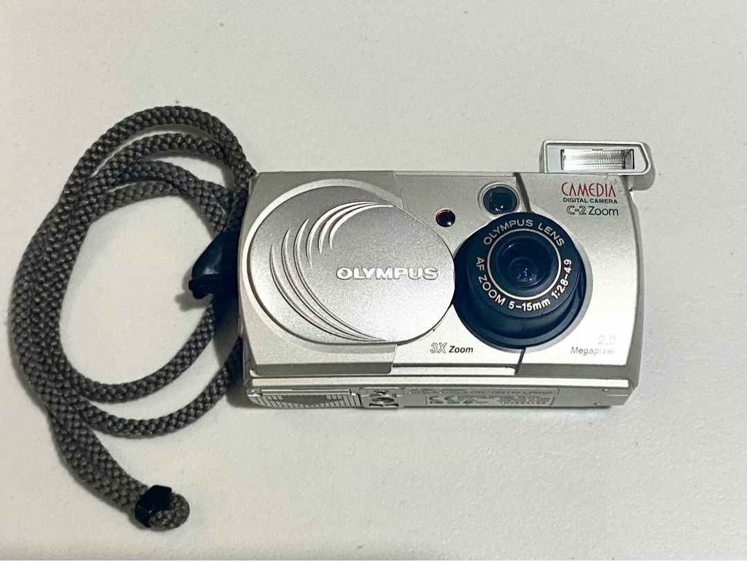 Rare Olympus Camedia C-2 Zoom Digital Camera / Digicam (Category: Cameras) located in Tuguegarao City. Submitted by naivepeach (Listing ID 1350047639, Image 1). Description: Free Shipping Fee :) Condition: • Body: 8/10 Some minor scratches from regular use, but nothing major (See photos) • LCD: 8.5/10 Minimal white dots that don’t affect photo quality, common in the Camedia line (See 5th photo) Key Features: • Card Type: SmartMedia Card • Sensor: