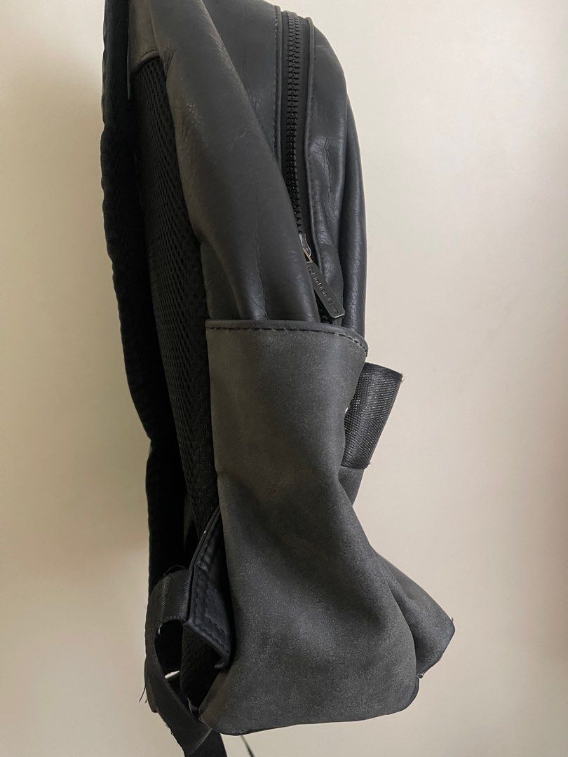 Calvin Klein (preloved) Backpack Original (Category: Backpacks) located in Cebu City. Submitted by doc_soon (Listing ID 1350128396, Image 2). Description: Decluttering medstudent. Making room for new bags. The issues are shown on the pics. Kindly browse. L= 39cm W= 36 cm Please be patient. I'm busy studying. Will reply once I'm caught up with med stuff. Thank you!😊.