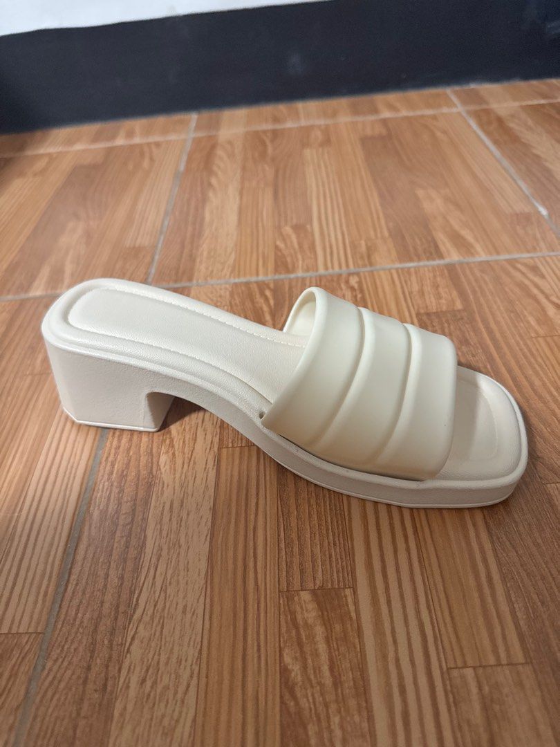 White Sandals (Category: Flats & Sandals) located in Marikina City. Submitted by deecluters (Listing ID 1350160589, Image 1). Description: Bought on 🍊 SIZE: 38 (EU) RFS: Too big on me hence never used MOP: Gcash MOD: Lalamove (Others will be accepted on the arrangement of buyer).