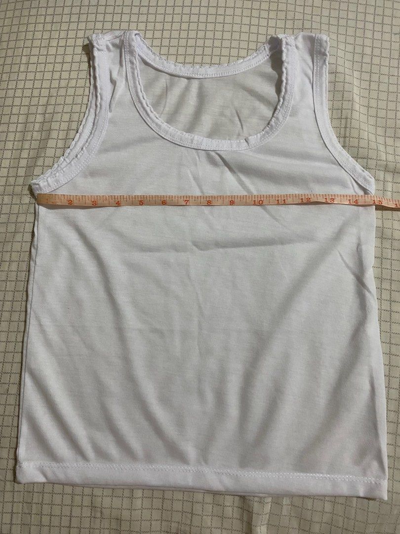 White Sando for Girls (Category: Babies & Kids Fashion) located in Quezon City. Submitted by practicalnanay (Listing ID 1350118606, Image 2). Description: White Sando for Girls 5pcs Take All, barely used Rfs: wrong size Bust 30inches Buyer to book and shoulder shipping/courier Pickup location: 1st Laguna St, Tandang Sora QC.