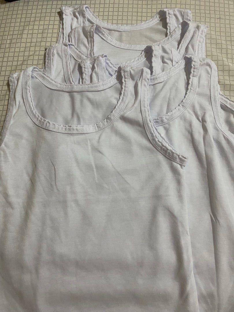 White Sando for Girls (Category: Babies & Kids Fashion) located in Quezon City. Submitted by practicalnanay (Listing ID 1350118606, Image 3). Description: White Sando for Girls 5pcs Take All, barely used Rfs: wrong size Bust 30inches Buyer to book and shoulder shipping/courier Pickup location: 1st Laguna St, Tandang Sora QC.