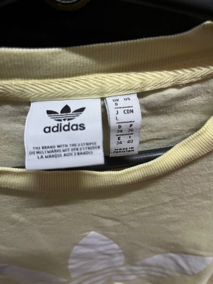 Adidas yellow shirt (Category: Shirts) located in Quezon City. Submitted by daniellearienne (Listing ID 1345219910, Image 2). Description: - in good condition - fits xs-small mop: gcash, gotyme, bdo mod: grab/lalamove, lbc.