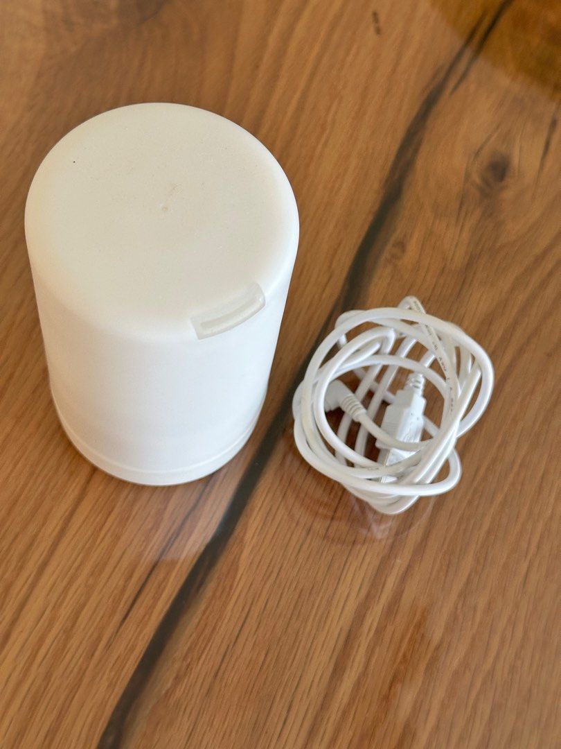 Aroma Diffuser Small (Category: Home Fragrance) located in Singapore. Submitted by tdyxy14 (Listing ID 1345143672, Image 3). Description: Like brand new, used a few times only Capacity is about 100-125ml Perfect for small desk space Water humidifier/diffuser RTP $15 Comes with usb wire No nego Only available with tracked letterbox shipping @ $2.20.