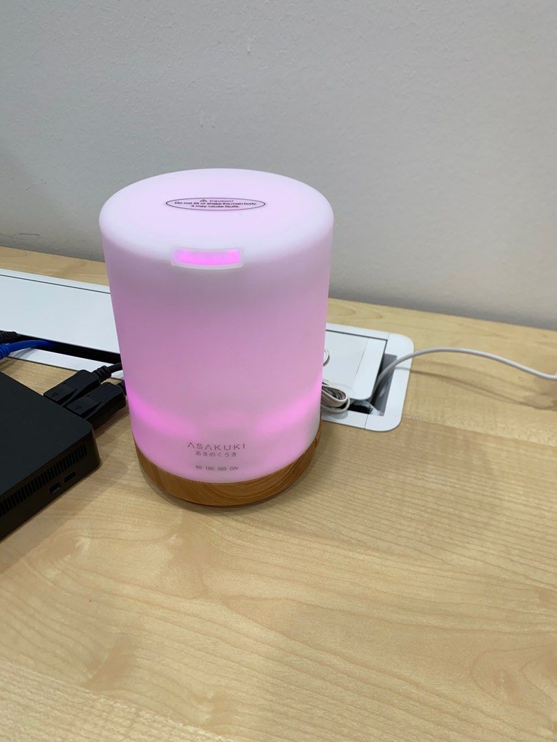 ASAKUKI Diffuser (Category: Home Fragrance) located in Singapore. Submitted by Diesel (Listing ID 1345144265, Image 2). Description: ASAKUKI Compact Diffuser for Sale Selling my ASAKUKI diffuser, perfect for office desks. It’s compact, sleek, and features a calming mood color lighting pattern. Great for keeping the air fresh and humidified in dry, air-conditioned spaces. 🔹 Condition: Very gently used, like new. 🔹 Reason for selling: Received a 
