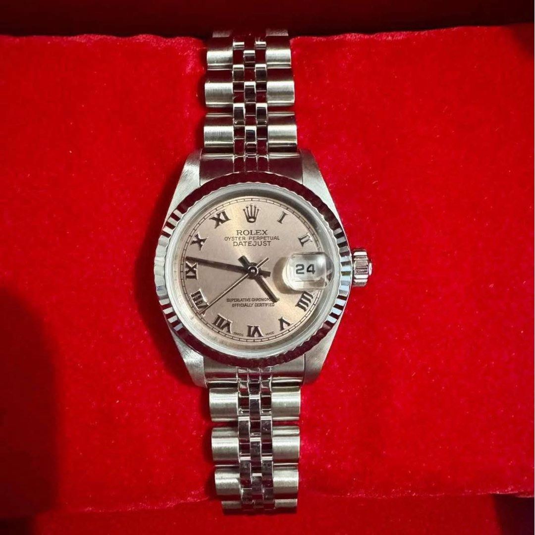 Authentic Rolex Date Just 26 Salmon Roman Dial (Category: Luxury Watches) located in Quezon City. Submitted by jhaediah (Listing ID 1345231678, Image 2). Description: DJ 26 Salmon Roman Dial 79174 2001 year model Complete inclusions.