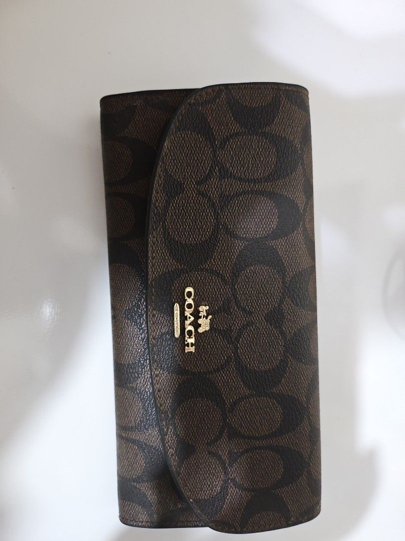 Coach Wallet (Category: Wallets & Card holders) located in Quezon City. Submitted by akinayan17 (Listing ID 1345202605, Image 1). Description: Coach wallet Brand new Gift only and never been used just stored.. Please see pictures for flaws. (not that obvious).