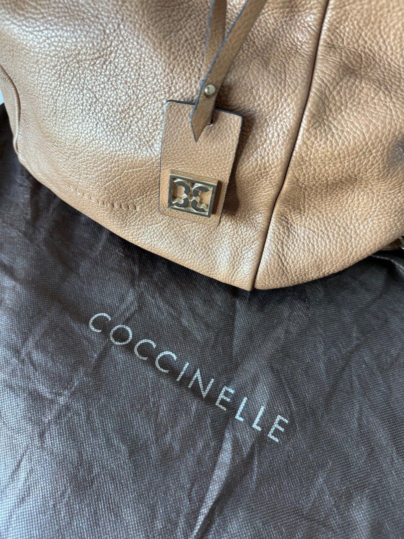 COCCINELLE hand bag with sling (Category: Luxury Bags & Wallets) located in Manila. Submitted by calligraphybyden (Listing ID 1345191123, Image 3). Description: Coccinelle handbag with sling Large size Can cardy a lot.