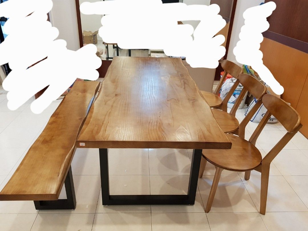 Dining Table (Category: Tables & Sets) located in Singapore. Submitted by ay93_preloved (Listing ID 1345141506, Image 3). Description: Solid wood dining table with 4 chairs and 1 long bench VERY HEAVY please arrange more than 2 persons to assist with transportation. self collection only at 670480.