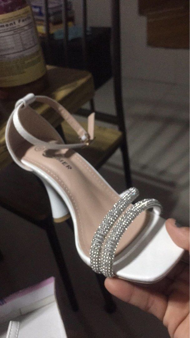 Fashion Sandals (Category: Heels) located in Valenzuela. Submitted by 2ndHandSpree (Listing ID 1345216049, Image 2). Description: This is a brand new Fashion sandals. Can be use with semi-formal to formal attire •size: 35-36 •color: white w/ silver accent •heel height: 3 inches .