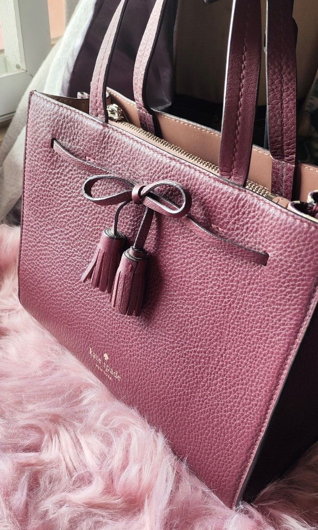 Kate spade maroon in medium size (Category: Luxury Bags & Wallets) located in Calamba. Submitted by starseed_lightworker (Listing ID 1345147231, Image 1). Description: 8/10 condition. bought as pre owned. No tarnish sa hardwares..