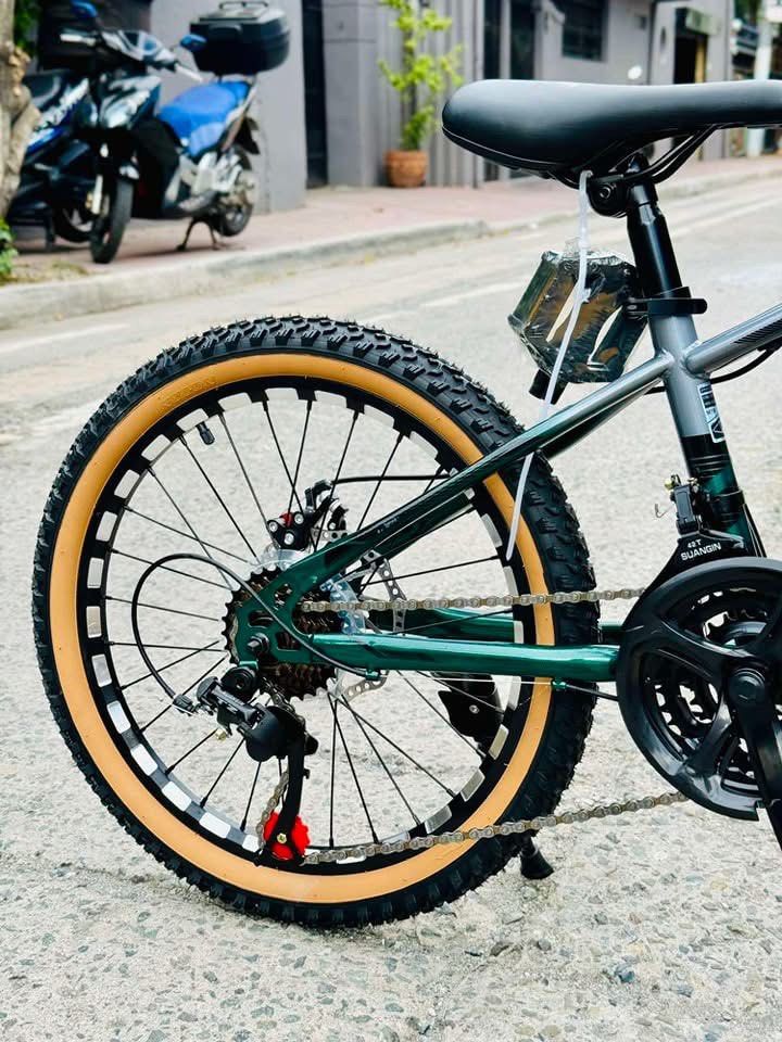 PROMAX PM5 3X7 MINI MTB 20ER (Category: Bicycles) located in Marikina City. Submitted by keionlines85428 (Listing ID 1345165018, Image 3). Description: PROMAX PM5 3X7 MINI MTB 20ER FREE ASSEMBLE ₱5,000 Specs: ▪️frame: promax pm5 internal cabling 2tone print ▪️fork: promax suspension ▪️shifter: rapidfire 3*7speed ▪️rd: 7speed TZ ▪️fd: 42T 3* Suangin ▪️brake: mecanical disc ▪️tire: tanwall 20*2.125 ▪️rim: alloy cnc double wall reflectorized ▪️adjus