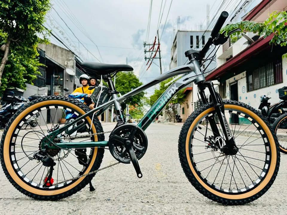 PROMAX PM5 3X7 MINI MTB 20ER (Category: Bicycles) located in Marikina City. Submitted by keionlines85428 (Listing ID 1345165018, Image 2). Description: PROMAX PM5 3X7 MINI MTB 20ER FREE ASSEMBLE ₱5,000 Specs: ▪️frame: promax pm5 internal cabling 2tone print ▪️fork: promax suspension ▪️shifter: rapidfire 3*7speed ▪️rd: 7speed TZ ▪️fd: 42T 3* Suangin ▪️brake: mecanical disc ▪️tire: tanwall 20*2.125 ▪️rim: alloy cnc double wall reflectorized ▪️adjus