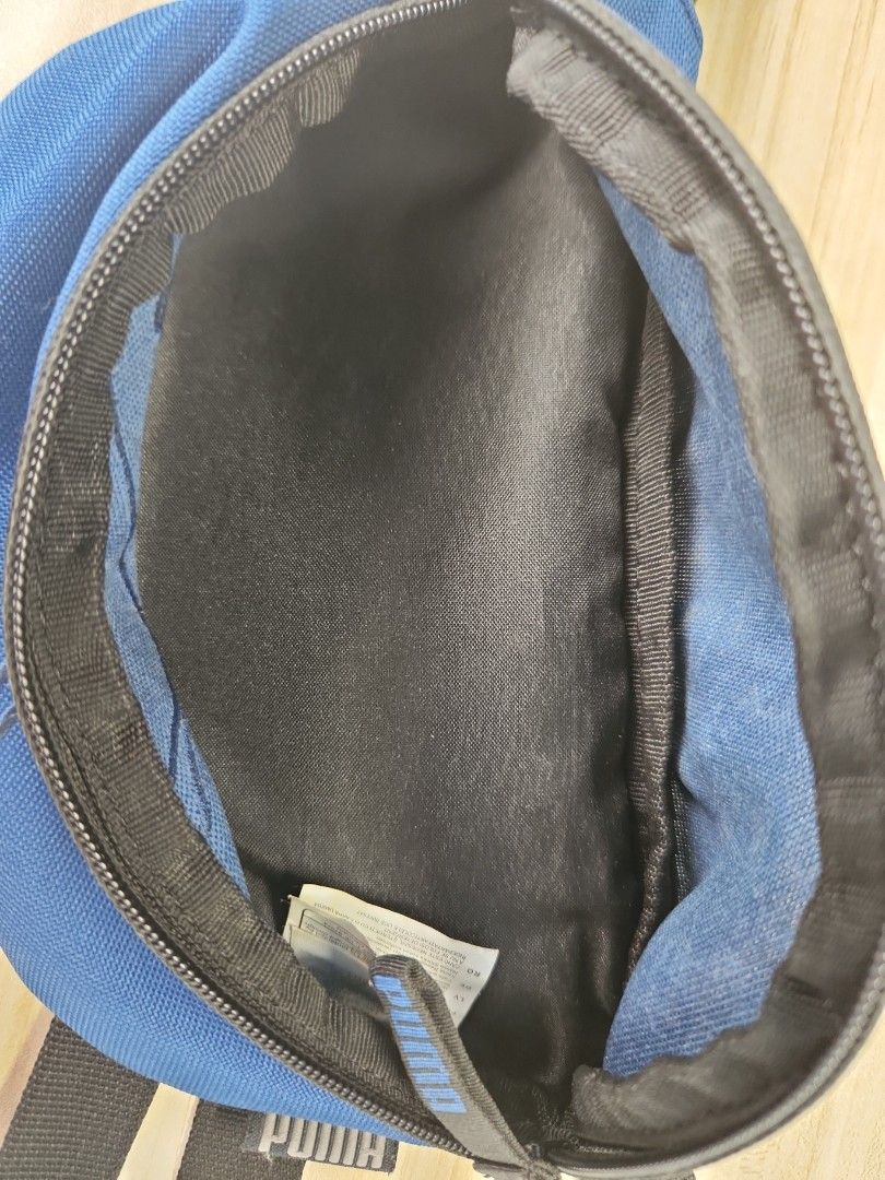 Puma pouch (Category: Belt bags, Clutches and Pouches) located in Singapore. Submitted by baka_chan22 (Listing ID 1345159921, Image 3). Description: Selling since no longer in use. Used a few times. still in good condition Size: A5 book Original price:$40.