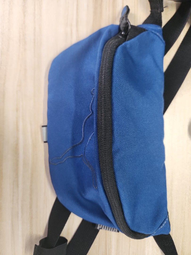 Puma pouch (Category: Belt bags, Clutches and Pouches) located in Singapore. Submitted by baka_chan22 (Listing ID 1345159921, Image 1). Description: Selling since no longer in use. Used a few times. still in good condition Size: A5 book Original price:$40.