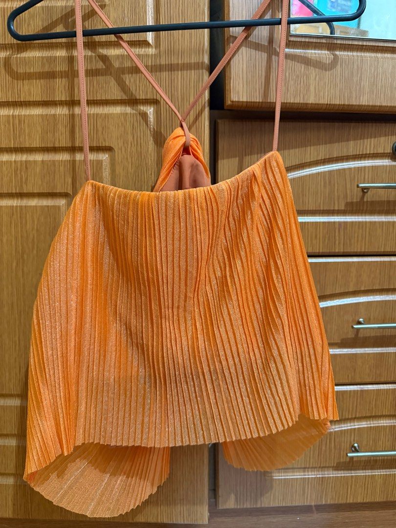 Shein orange top (Category: Blouses) located in Quezon City. Submitted by ctrnjrh (Listing ID 1345134852, Image 2). Description: I bought this thru an online Shein reseller. I have no when worn pics bec it doesn’t fit me. If you have broad shoulders with 34 - 36a/b bust size, this might be a good fit for you. Tight na for 38a/b..
