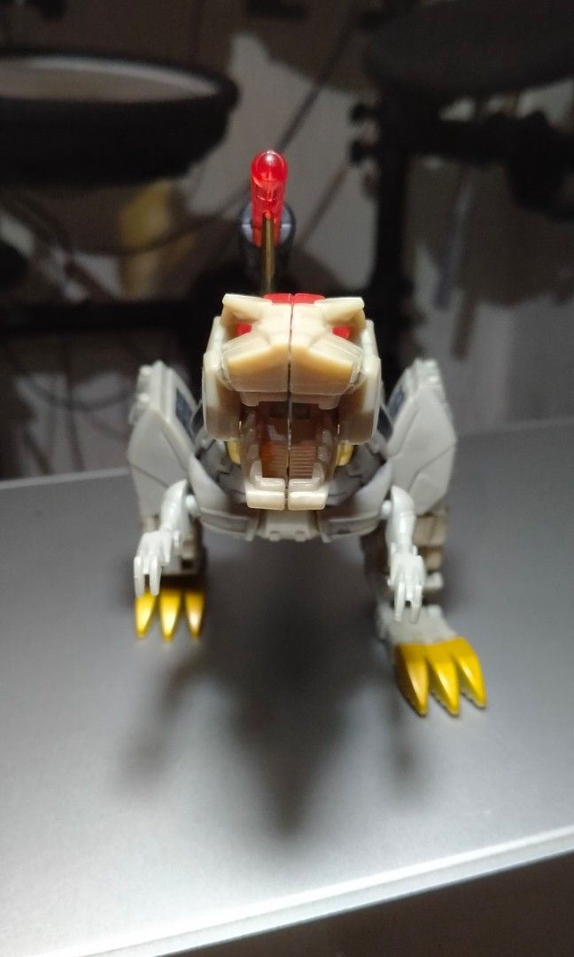 Transformers Deluxe Classic - Grimlock (Category: Action & Battle Toys) located in Pasay City. Submitted by silentbear_c00b58 (Listing ID 1345262346, Image 3). Description: Transformers Deluxe Classic - Grimlock Released: From the Transformers Classics line (2006) Condition: Slightly used Includes: Manual (no box) Features: All parts complete, missile launcher fully functional This Grimlock figure from the Transformers Classics line is a must-hav