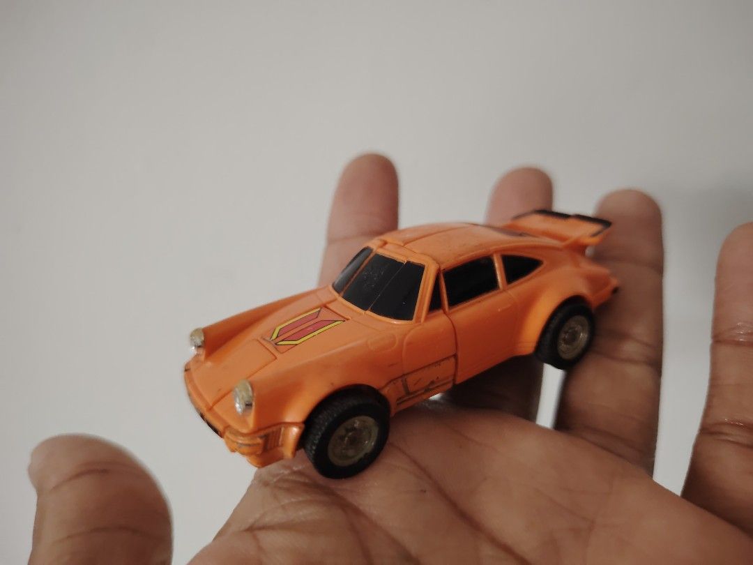 VINTAGE GOBOTS CROSSWORD COMBINER 1985 ORANGE PORSCHE FIGURE BANDAI