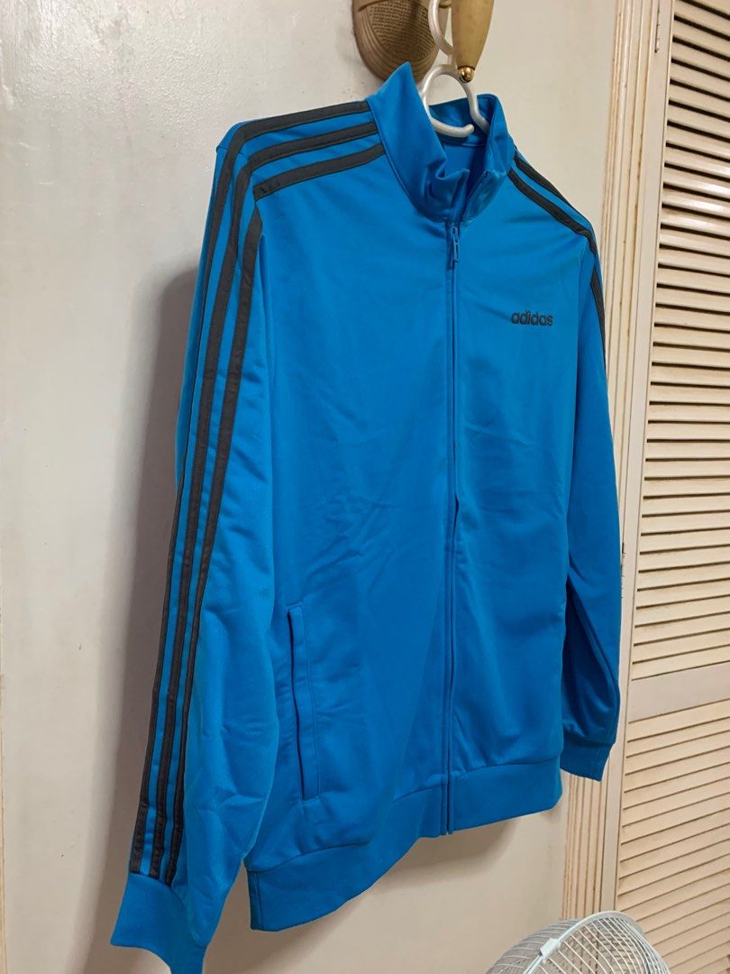 Authentic ADIDAS TRACK SUIT (Top & Pants) (Category: Sets & Coordinates) located in Muntinlupa City. Submitted by arisofcalico (Listing ID 1350289672, Image 2). Description: Authentic Adidas track suit Size US Medium (both sizes) Unique color combination (Reverse color style on stripes and fabric) Light blue and dark grey reversed on jacket & trousers Made in Jordan & Cambodia Unisex fit Chest size: 20 inches Waist (tousers): 33 inches (Garterize