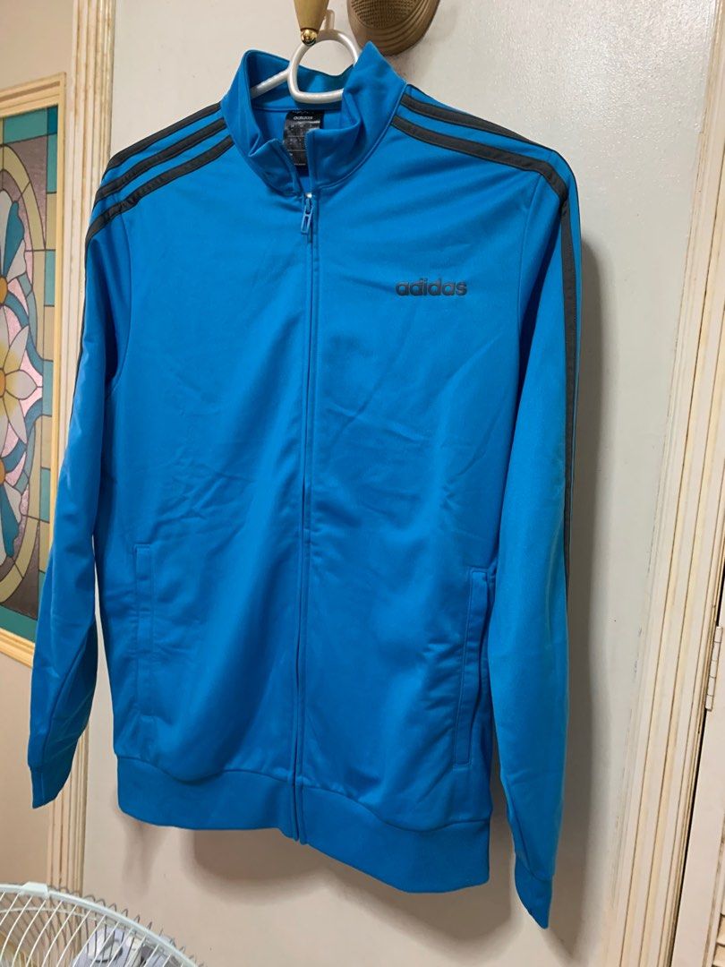 Authentic ADIDAS TRACK SUIT (Top & Pants) (Category: Sets & Coordinates) located in Muntinlupa City. Submitted by arisofcalico (Listing ID 1350289672, Image 1). Description: Authentic Adidas track suit Size US Medium (both sizes) Unique color combination (Reverse color style on stripes and fabric) Light blue and dark grey reversed on jacket & trousers Made in Jordan & Cambodia Unisex fit Chest size: 20 inches Waist (tousers): 33 inches (Garterize
