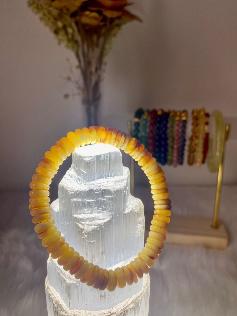 Beeswax Amber Bracelet 17-18cm (Category: Precious Stones) located in Las Pinas. Submitted by _chic (Listing ID 1350301333, Image 2). Description: Amber and beeswax have many benefits, including: Skincare: Beeswax can moisturize, soothe, and protect the skin from irritants and environmental pollutants. It can also help with rosacea, eczema, and other skin ailments. Haircare: Beeswax can nourish, condition, and soften hair, while also promoting ha