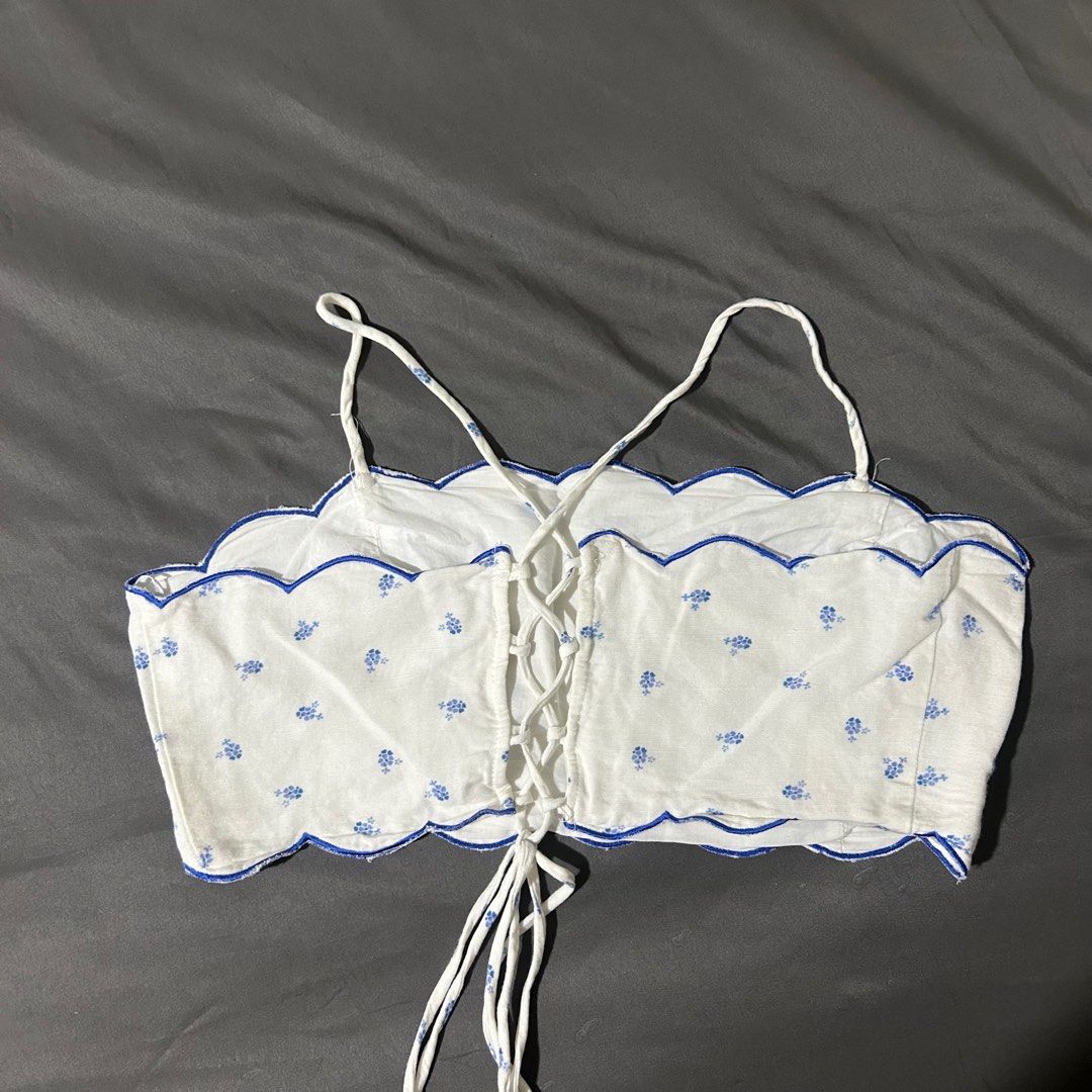 Blue white floral scallop top (Category: Sleeveless) located in Quezon City. Submitted by p0lingkit (Listing ID 1350242115, Image 3). Description: • see pic for measurement • fabric is soft, not sure if its cotton or linen • i dont use it anymore • no when worn • strap is adjustable Not sure if zara or h&m hehe.