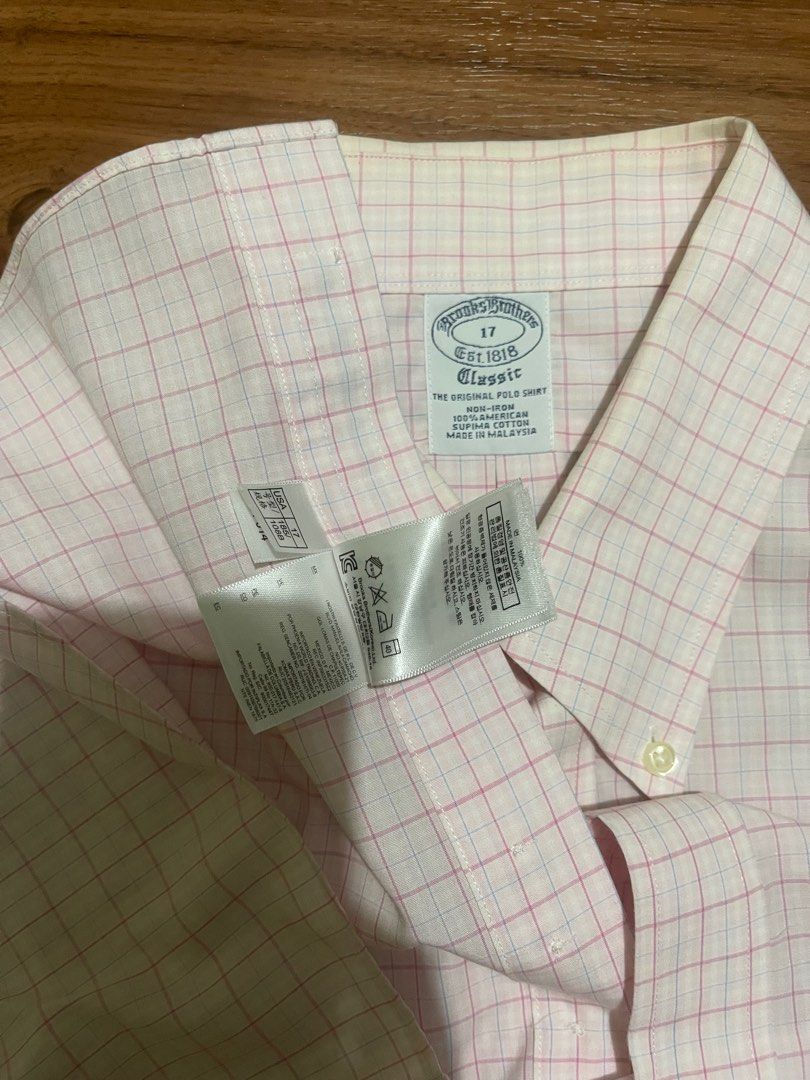 Brooks Brothers light pink checkered Polo (Category: Tshirts & Polo Shirts ) located in Mandaluyong City. Submitted by limonlime (Listing ID 1350297815, Image 2). Description: Size 17 (around XL) 100% American Supima Cotton Made in Malaysia Rarely used, can pass as brand new Negotiable Reason for sale: too oversized for me Mandaluyong Location .