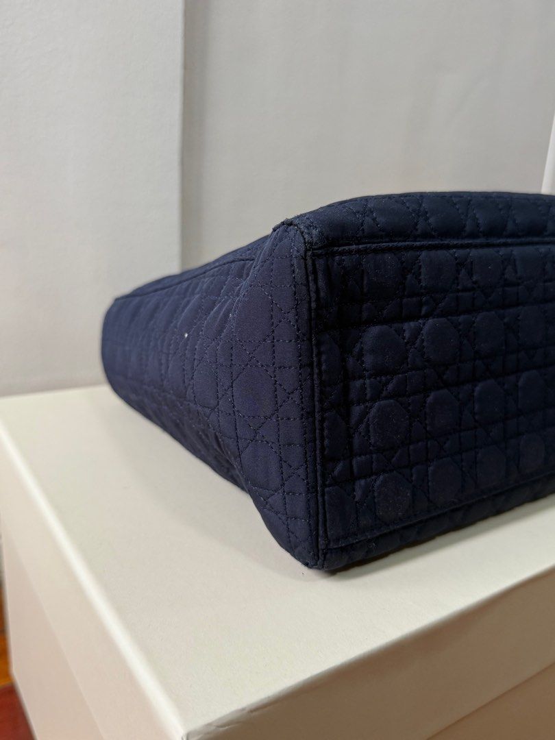 Vintage Lady Dior Bag (Category: Luxury Bags & Wallets) located in San Juan City. Submitted by nnnryo (Listing ID 1350255650, Image 2). Description: - bought in a preloved ig store Japanluxxsale - vintage - well used, please photos of some flaws on the hardware otherwise everything is in good condition - color is navy blue - gold hardware - no strap but could give generic 5cm wide strap - generic dustbag only - i can send more photos.