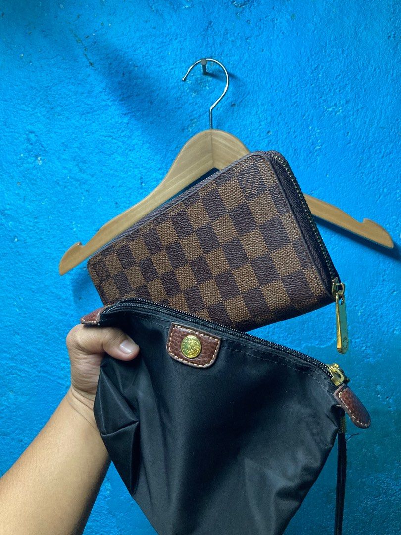 Louis vuitton and long champ wallet (Category: Luxury Bags & Wallets) located in Quezon City. Submitted by thriftxgoods (Listing ID 1350365309, Image 2). Description: Forsale Louis vuitton&longchamp wallet Good condition Aspack 400 DM ME .