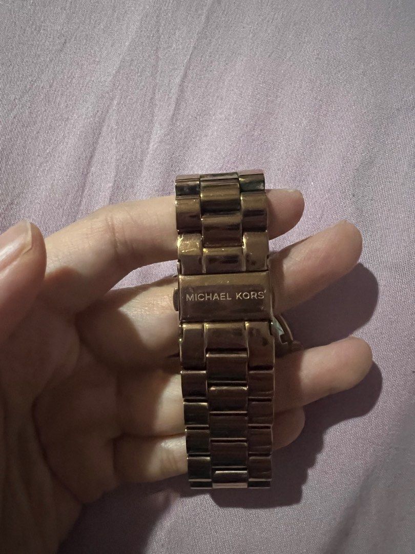 MK rose gold watch (Category: Women's Watches) located in Quezon City. Submitted by mommamd (Listing ID 1350315118, Image 3). Description: Comes with free KS and Coach bangles .