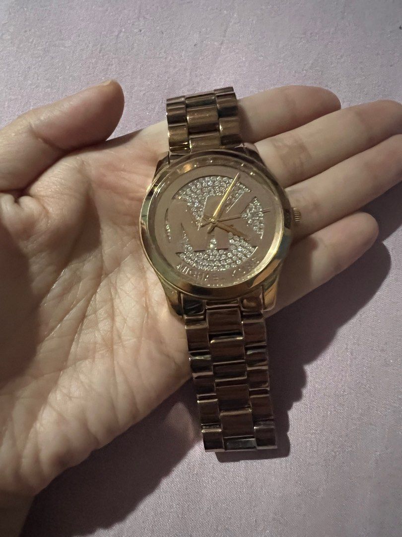 MK rose gold watch (Category: Women's Watches) located in Quezon City. Submitted by mommamd (Listing ID 1350315118, Image 2). Description: Comes with free KS and Coach bangles .