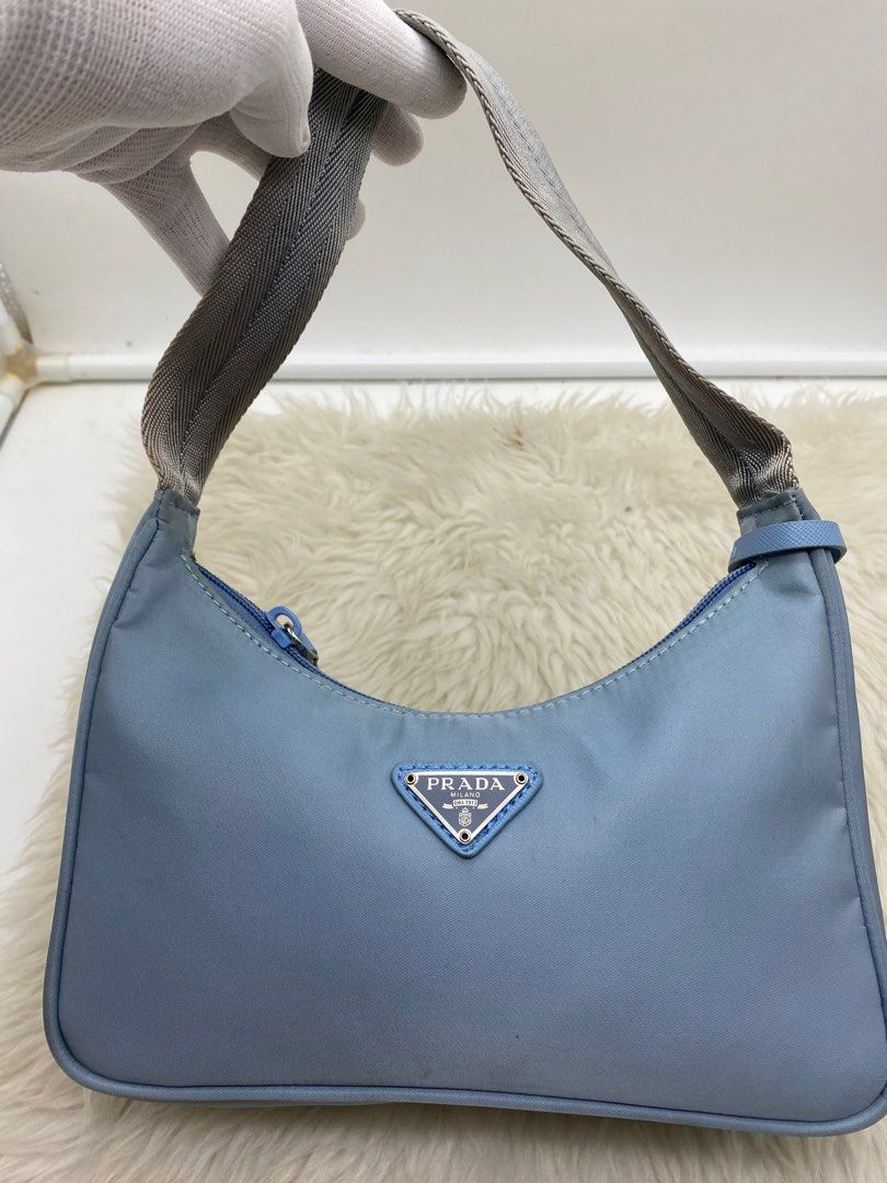 PRADA BAGUETTE BAG❤️ (Category: Luxury Bags & Wallets) located in Bacolod City. Submitted by chuchaystuffs (Listing ID 1350293257, Image 1). Description: Mehel to da selling pro self authentication. Is advised with code and tag.