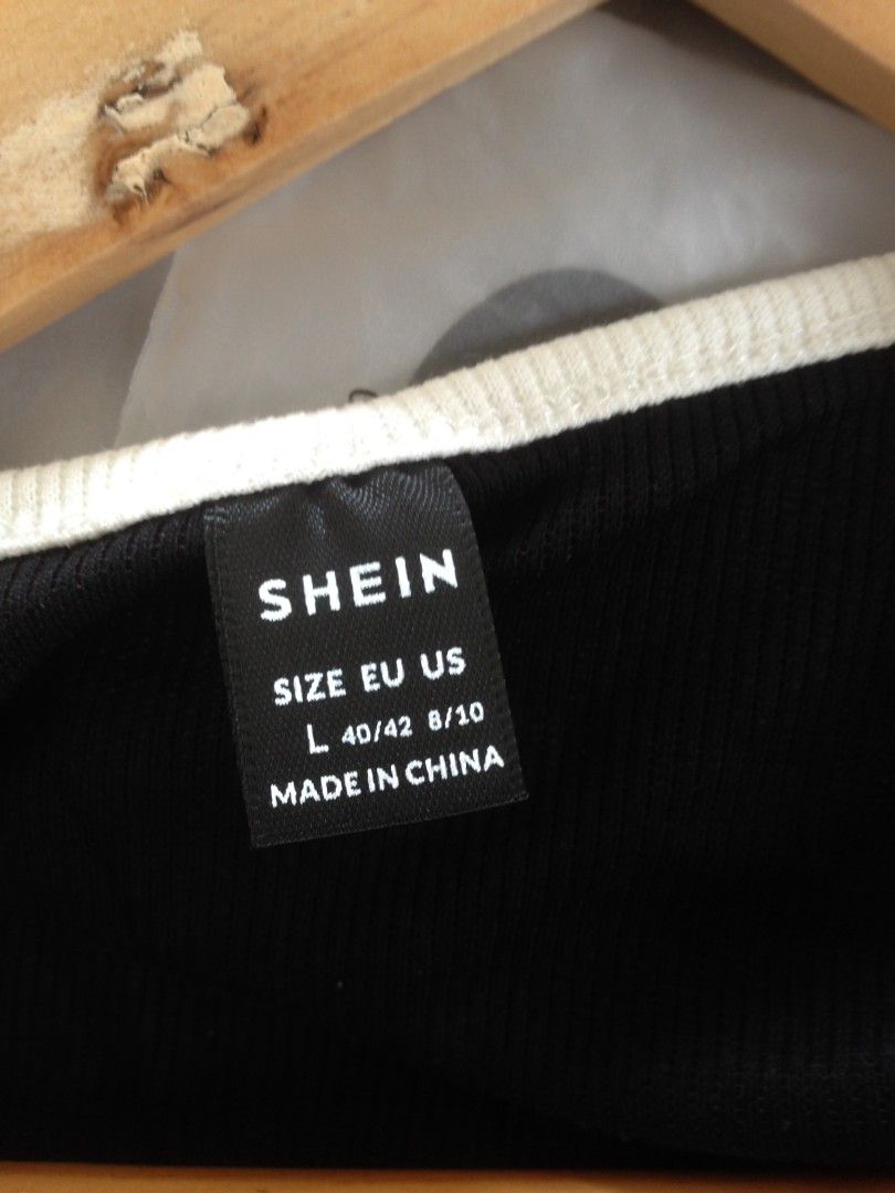 Shein Buckle Cut Out Front Croptop (Category: Sleeveless) located in San Fernando. Submitted by hellokteesph (Listing ID 1350342954, Image 3). Description: Shein brandnew with pouch rare top large on tag.