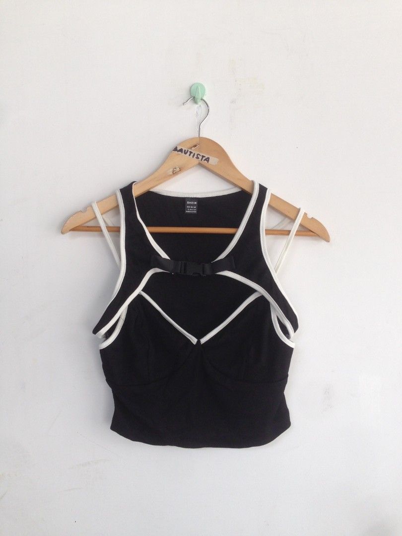 Shein Buckle Cut Out Front Croptop (Category: Sleeveless) located in San Fernando. Submitted by hellokteesph (Listing ID 1350342954, Image 1). Description: Shein brandnew with pouch rare top large on tag.
