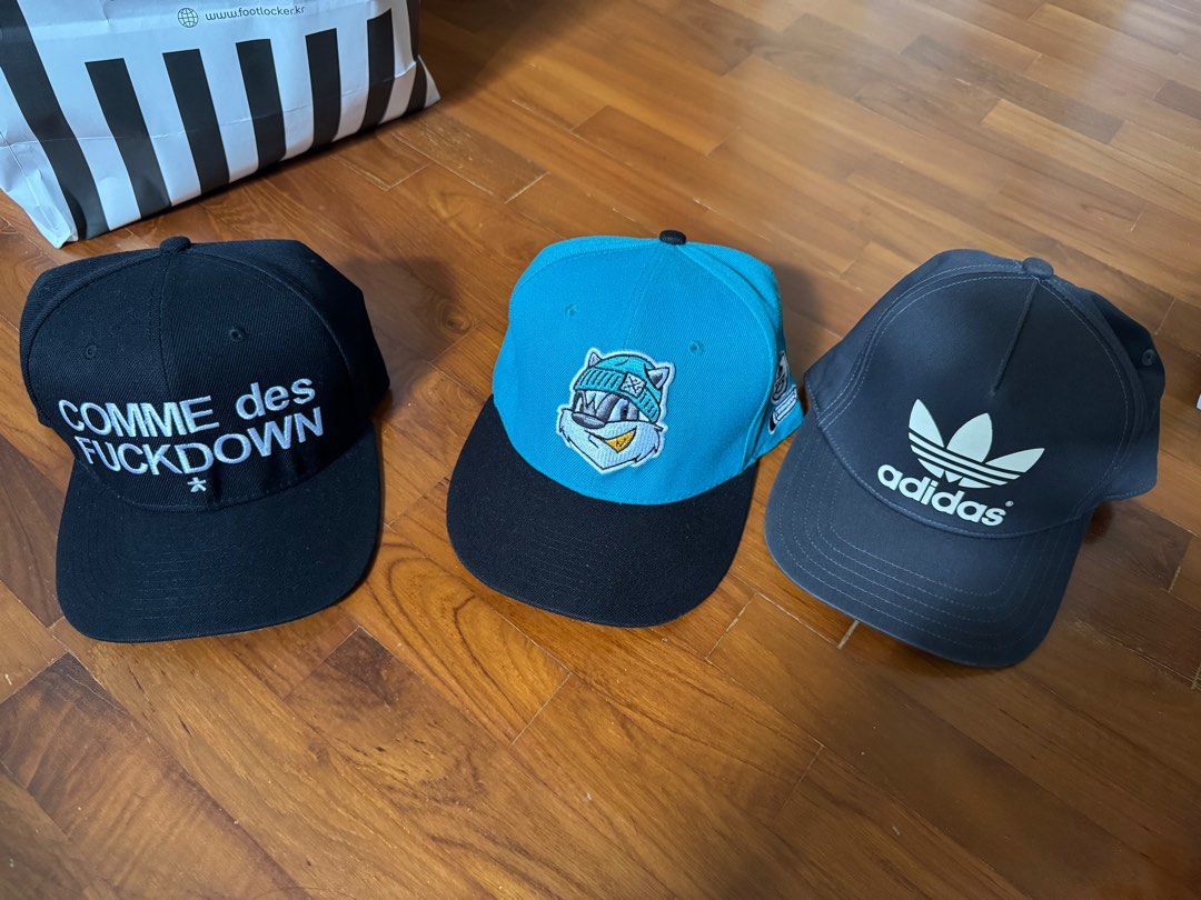 SnapBack cap (Category: Caps & Hats) located in Singapore. Submitted by gimmedatmilodinosaur (Listing ID 1350249621, Image 1). Description: Comme des $10 Neff $10 Adidas $20.