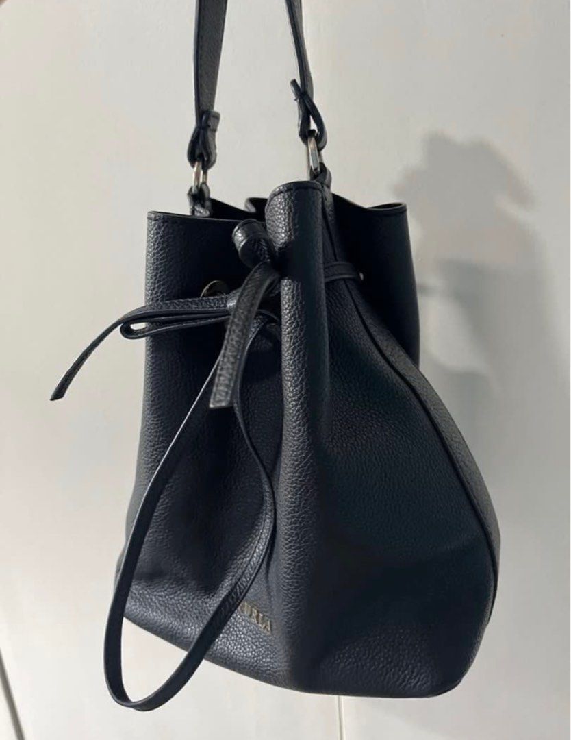 Authentic FURLA Bucket Bag "FREE SHIPPING" (Category: Luxury Bags & Wallets) located in Tarlac. Submitted by clxryxann (Listing ID 1350538780, Image 3). Description: Soft Genuine leather Spacious Condition: 8/10 with minimal sign of usage Authentic 💯.