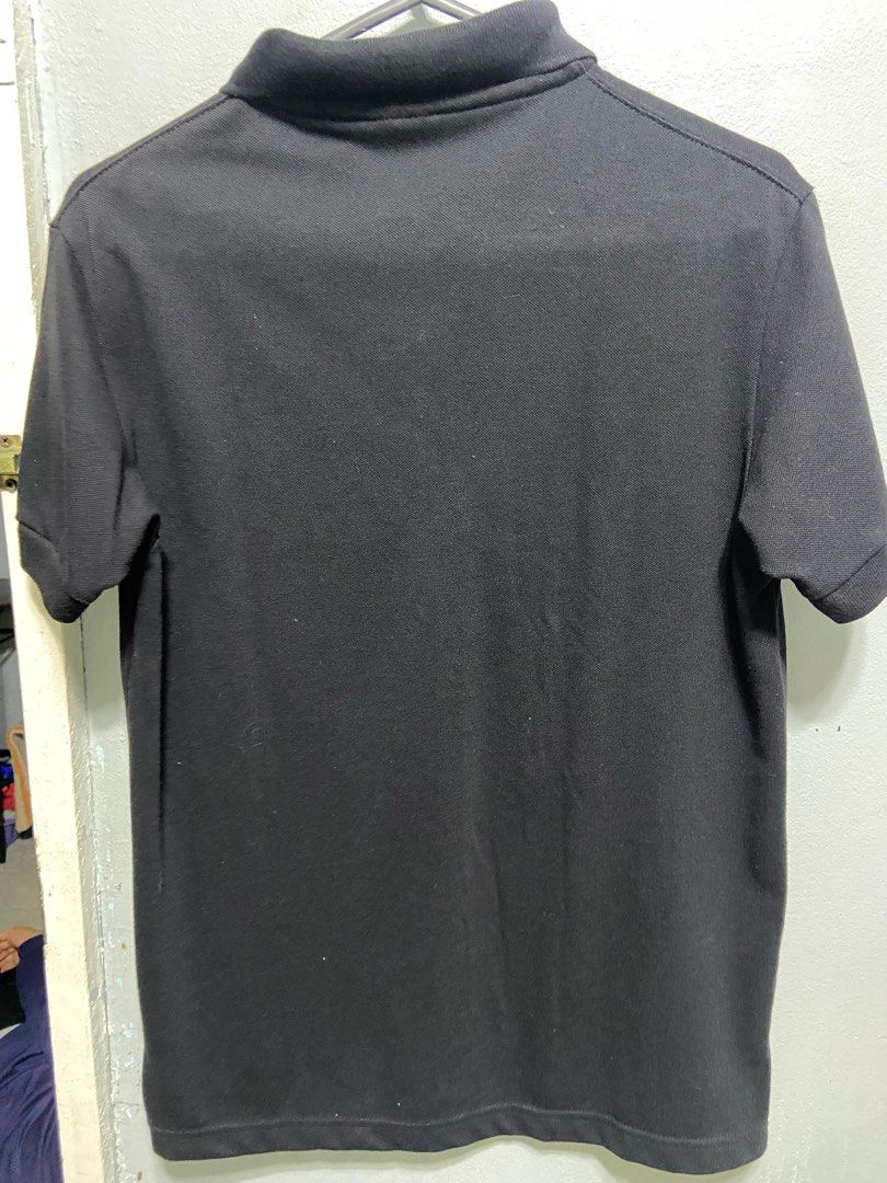 Black plain polo shirt (unisex) (Category: Tshirts & Polo Shirts ) located in Cavite. Submitted by dmprelovedclothes (Listing ID 1350514466, Image 3). Description: 9/10 condition Never worn but tag removed Unisex DM for interested.